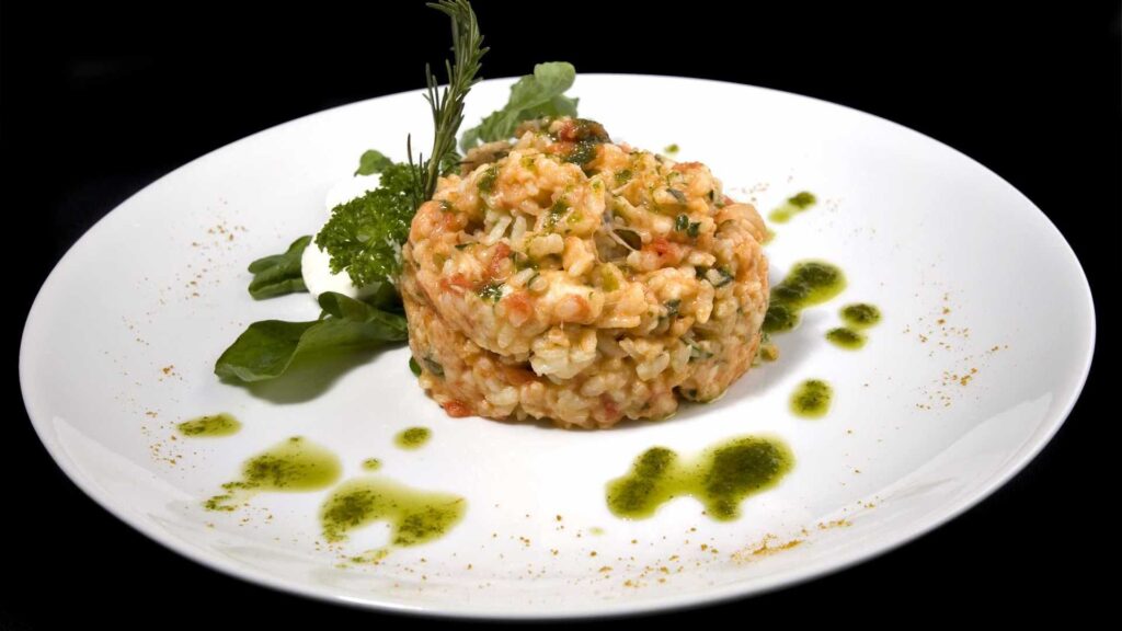Risoto com Tomate Seco Rucula e Mussarela de Bufala