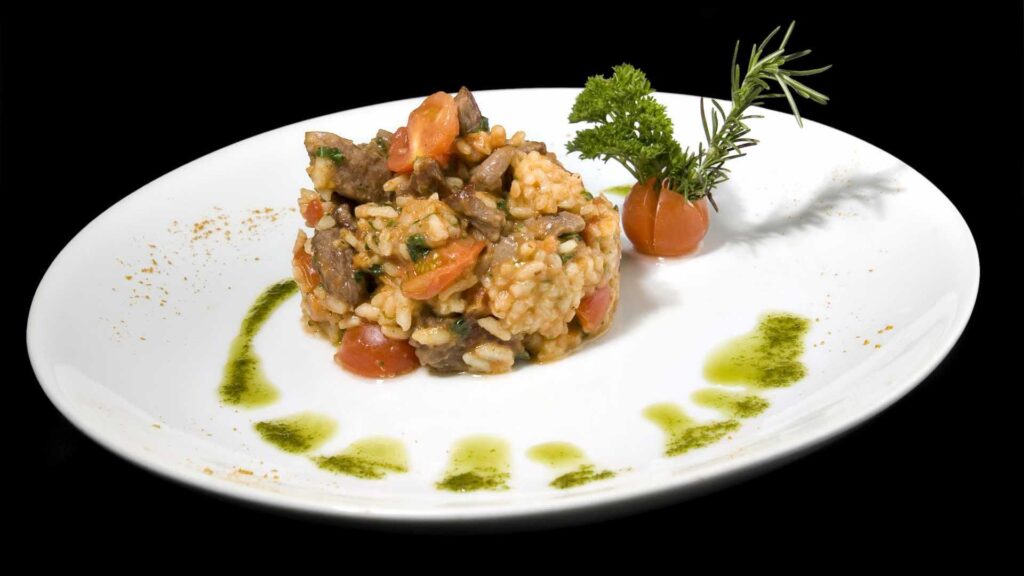 Risoto com mignon rucula e tomate cereja